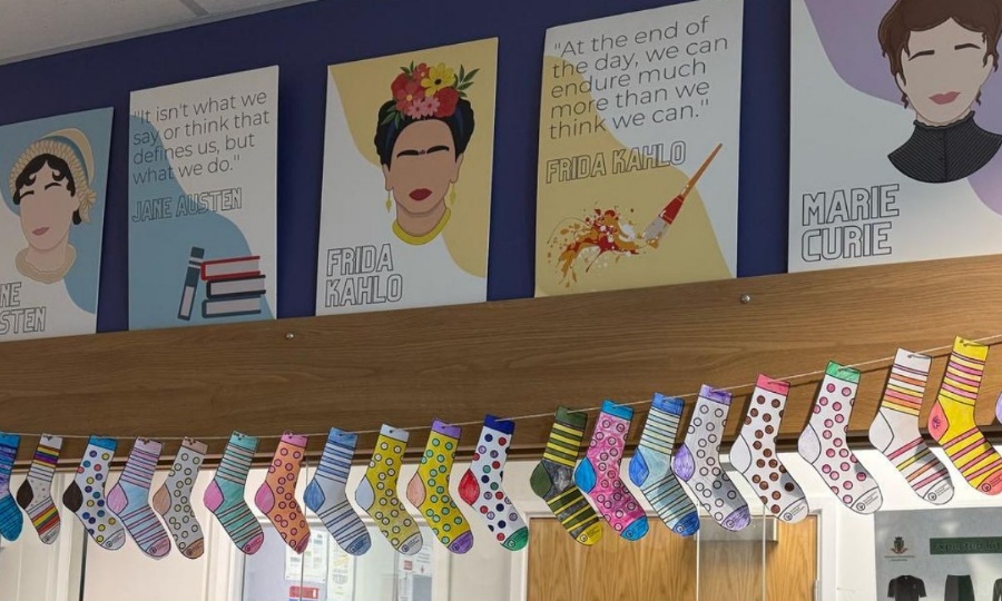 photograph of paper socks strung up on display at reception